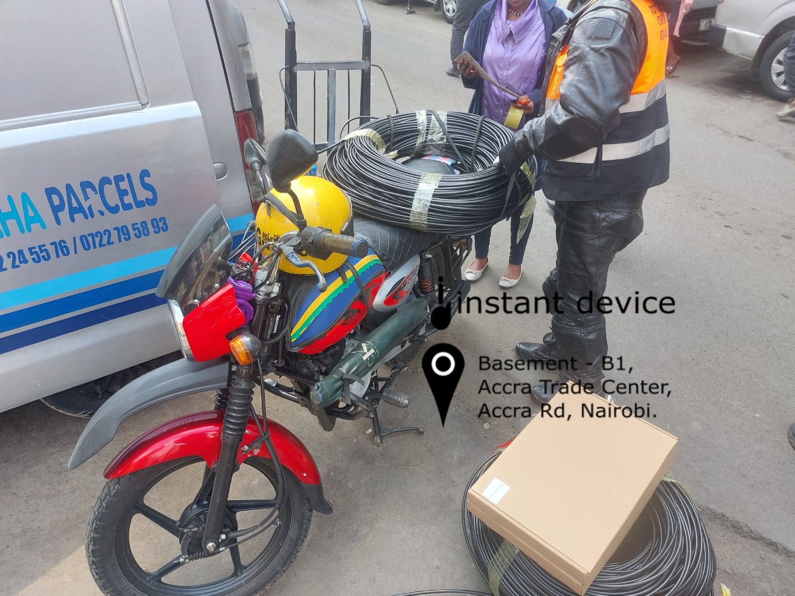 Haggling on the street with Kenyan riders. Instance Device Limited outsources riders to deliver networking equipment to clients in Nairobi. Photo taken on Kenneth Matiba Road, outside Accra Trade Center